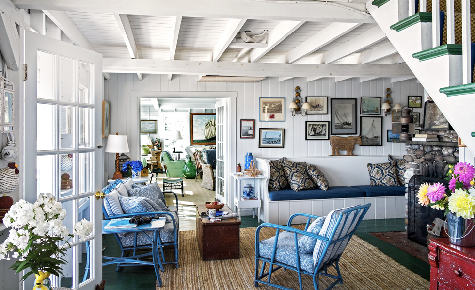 a maine living room with a collected gallery wall