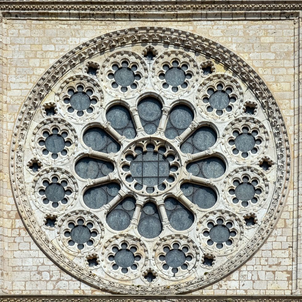 majestic close up view of the rose window of the cathedral of chartres in loire valley, france