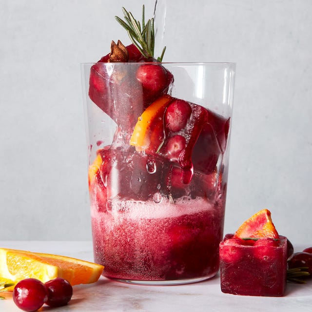 Make Ahead Holiday Punch Bowl Ice Cubes red frozen ice cubes with orange slices and spices
