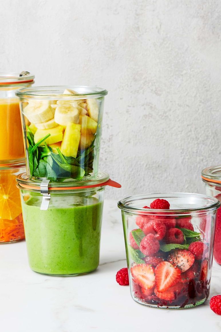 fruit and veggies in a glass container