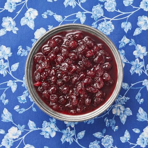 homemade cranberry sauce on blue surface