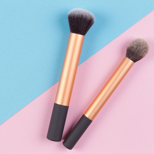 Make-Up Brushes On Colored Background