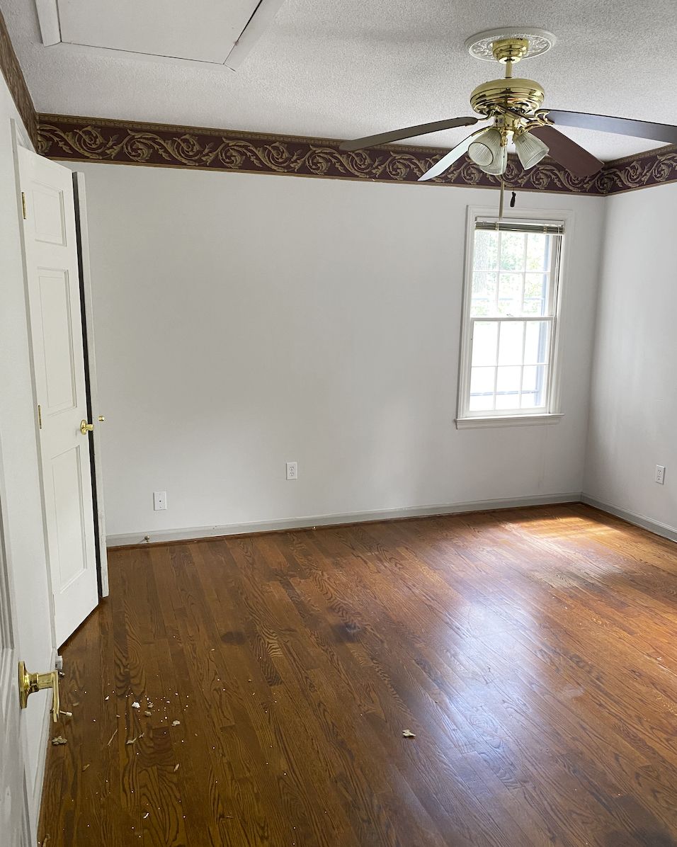 empty bedroom with wood floor