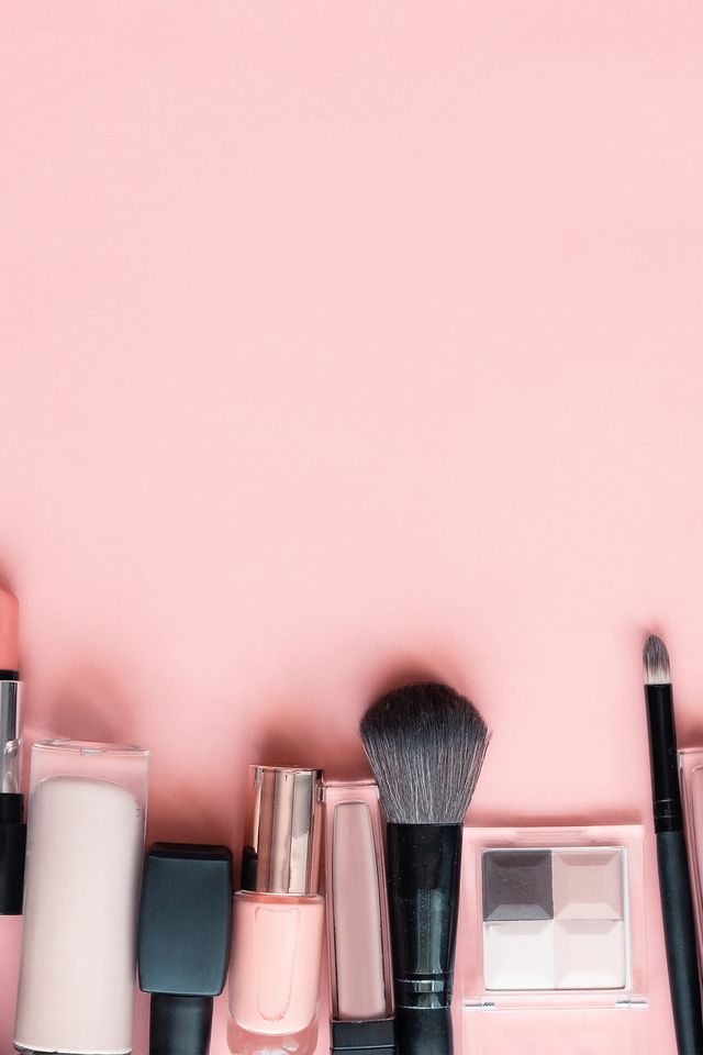 beauty make up cosmetic women products accessories in line row on pink flat lay background, cheap discount commercial retail sale offer online purchase, top view above copy space, makeup wide banner