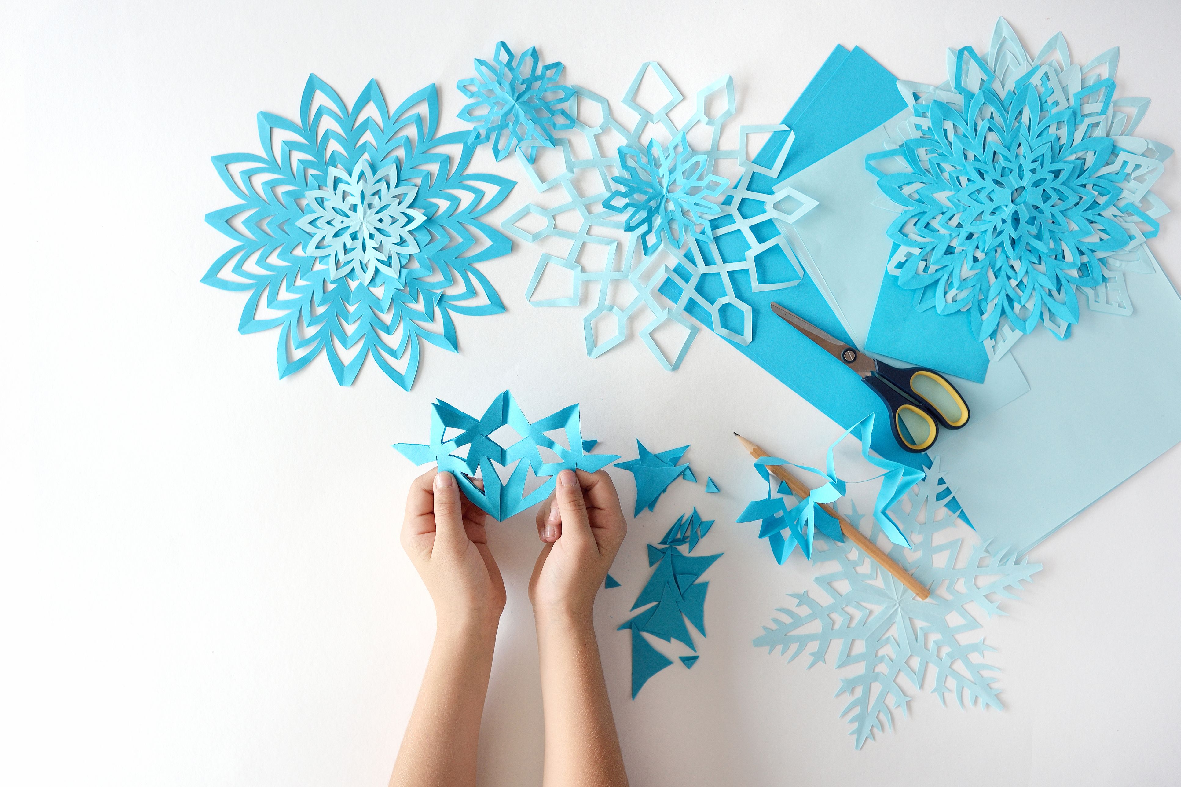 How To Make Paper Snowflakes - diy Thought