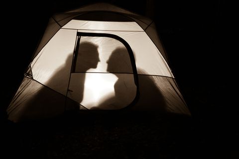 Male and Female Intimacy Lovers Kissing Vignettes inside Illuminated Camping Tent