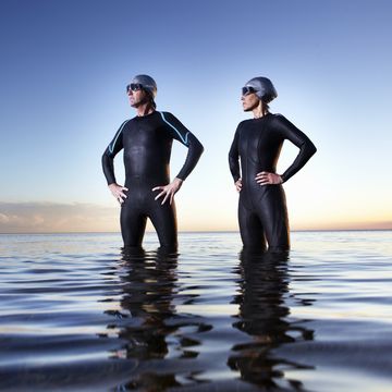 male and female triathlete after swimming event