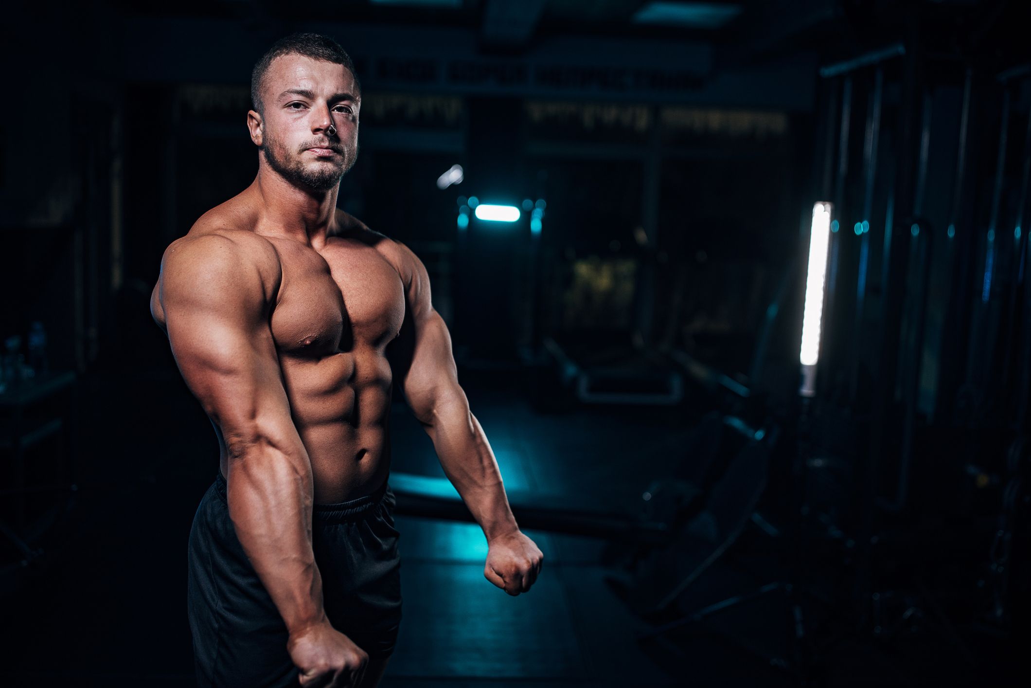 half body of muscular bodybuilder man, upper body , isolated with black  background Stock Photo