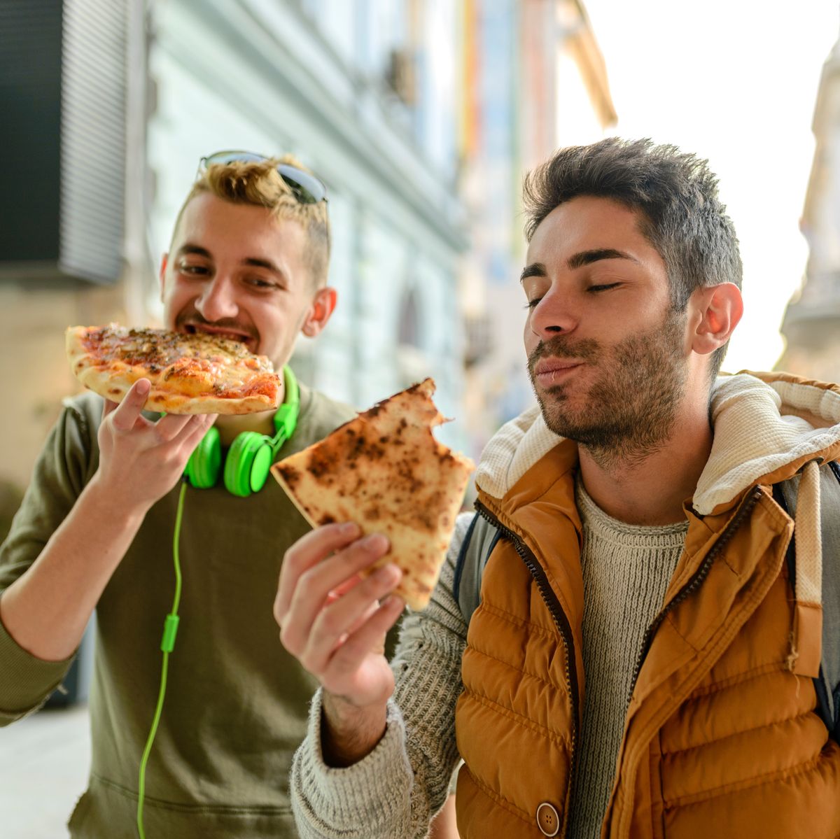 Male Friends Having Pizza