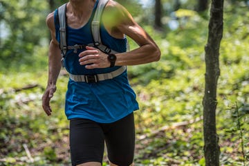 male hiker in forest