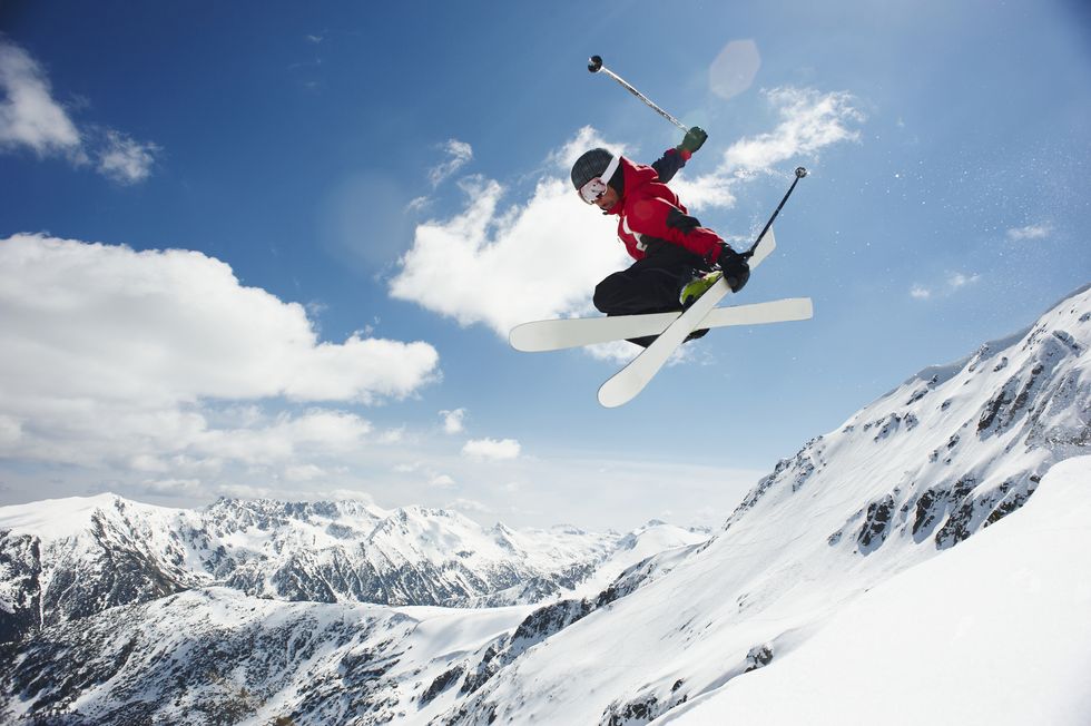 Male Skier Jumping Off Bansko Cornice
