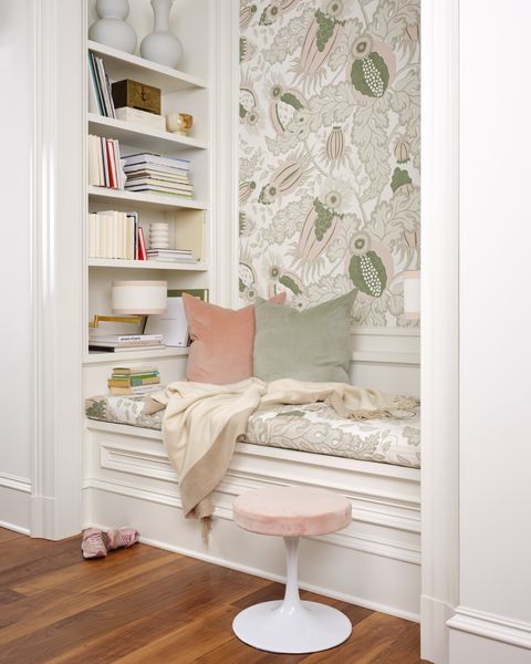 reading nook, pink side table, floral wallpaper, bookcase