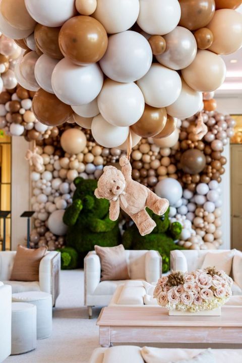 bear themed baby shower with balloon wall and topiary bears