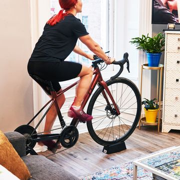 a person riding a bicycle indoors