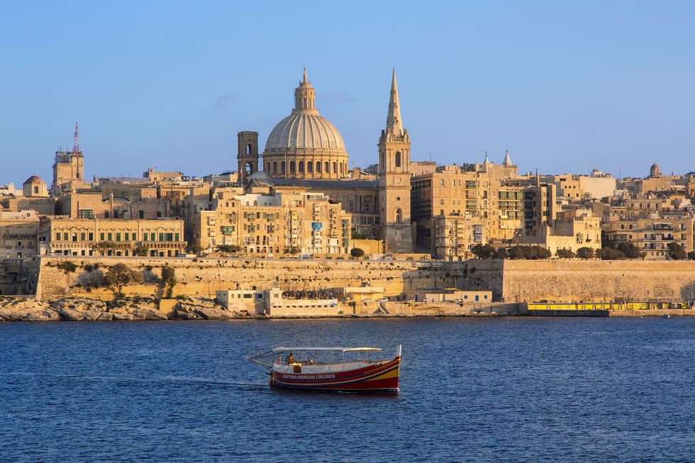 malta, valletta, skyline with st pauls anglican cathedral and carmelite church from sliema,
