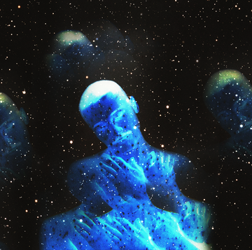 a man's silhouette in blue is shown in a night sky