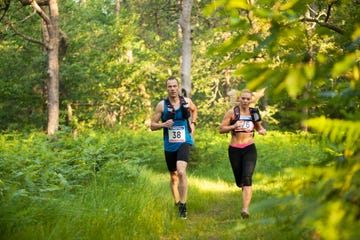 man and woman in ultramarathon race