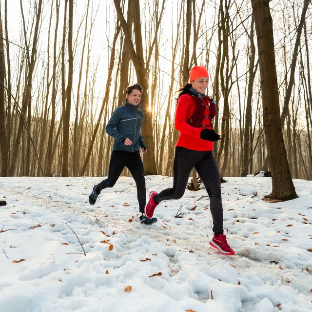 https://hips.hearstapps.com/hmg-prod/images/man-and-woman-running-together-through-woods-in-royalty-free-image-1646245646.jpg?crop=0.668xw:1.00xh;0.230xw,0.00255xh&resize=640:*