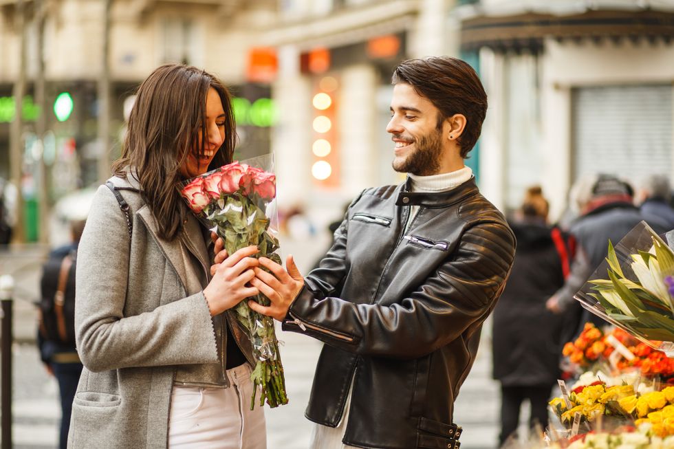 man buys flowers for his dearest