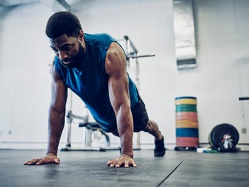 man cross training in a gym