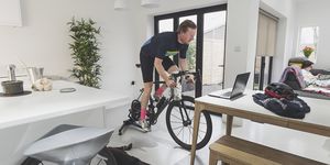 Man cycling on turbo trainer