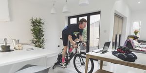 man cycling on turbo trainer
