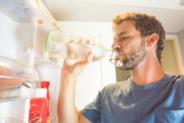 man drinking water