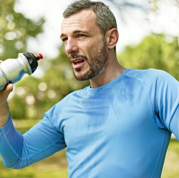 man drinking water