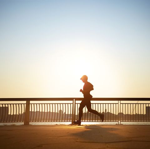 man enjoying an early morning jog in the city.