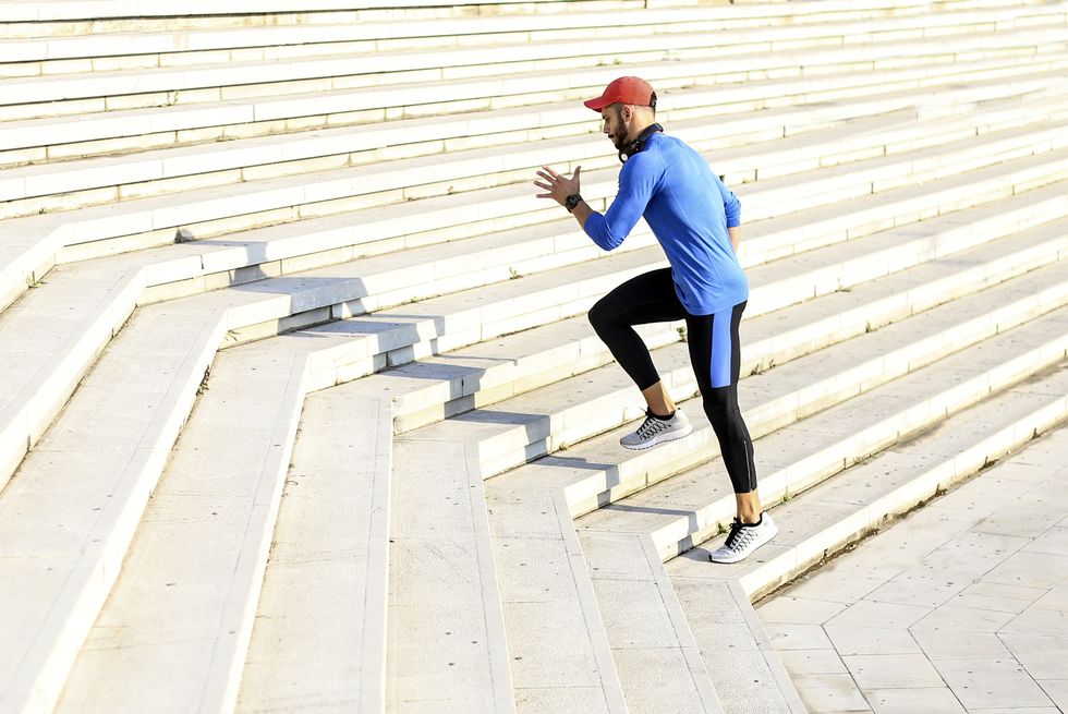man exercising on stairs