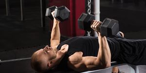 Man Exercising With Dumbbell