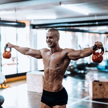 Man exercising with kettlebell in the gym
