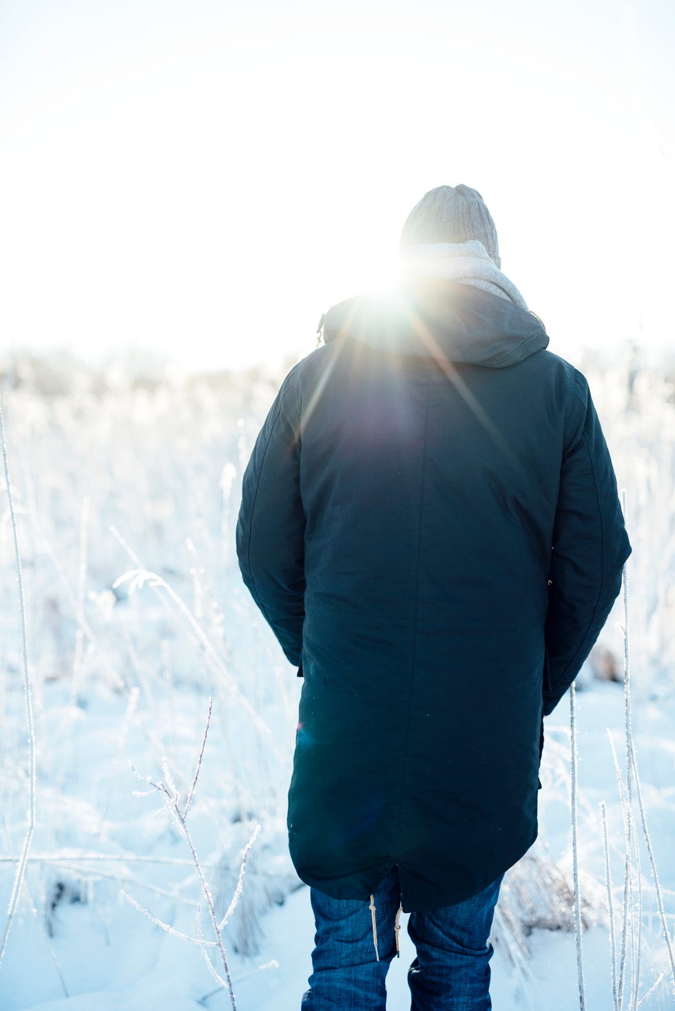 A man from behind, outdoors