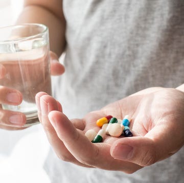 man hand holding medicine