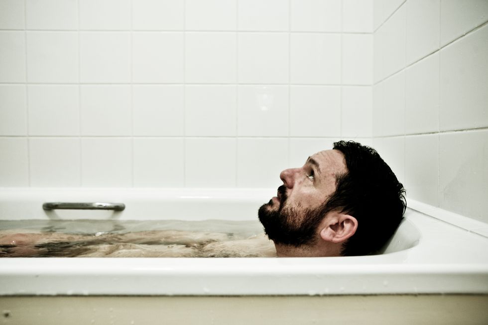 man in bathtub