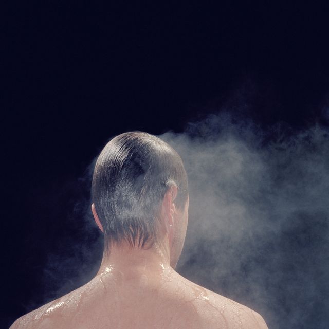 man in sauna, rear view
