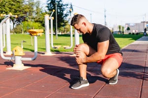 man injured his knee during training