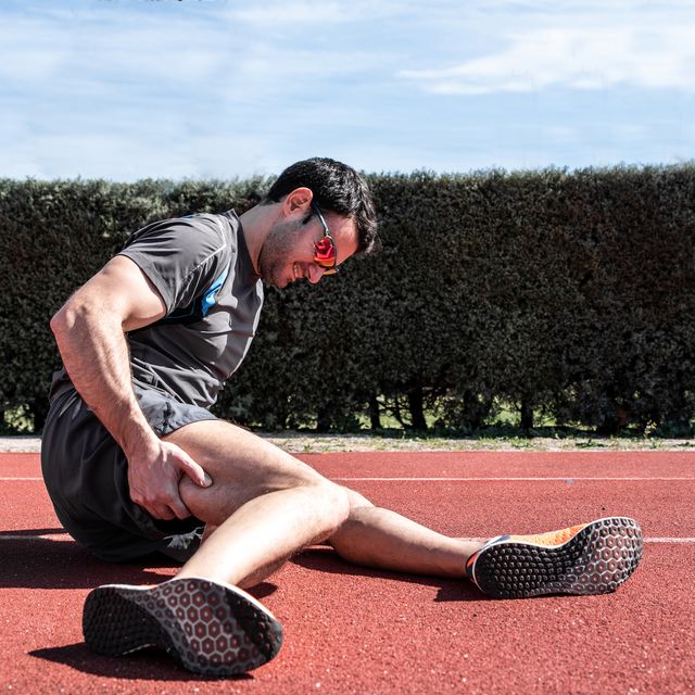 man injured in the middle of the athletics track