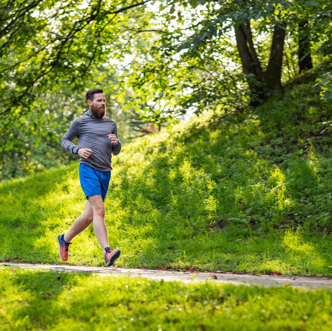 man jogging in a park