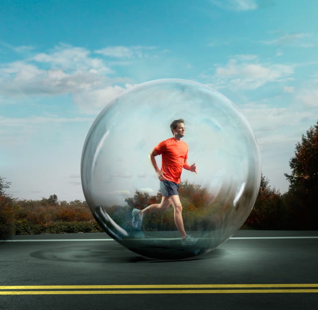 man jogging surrounded by bubble