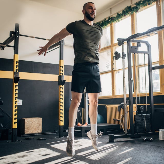 man jumping in gym