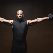 man lifting weights, portrait