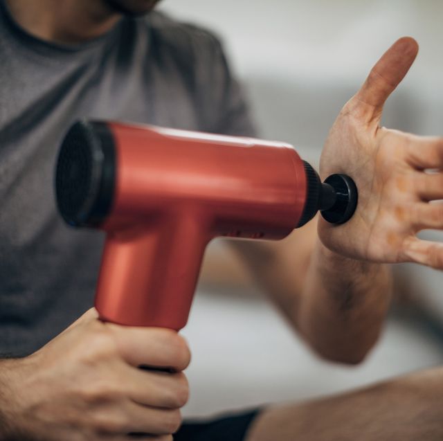 man massaging his palm