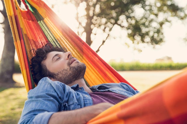 man napping in hammock