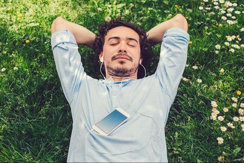 man napping in the grass