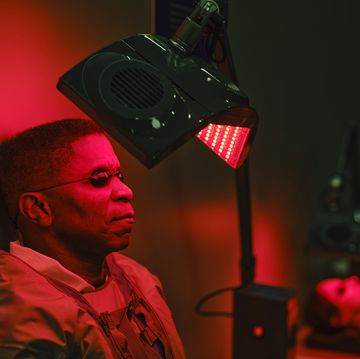 man on an led bed receiving red light therapy