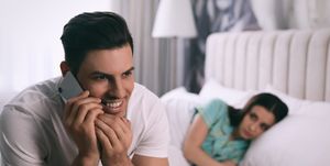 man preferring talking on phone over spending time with his girlfriend at homejealousy in relationship