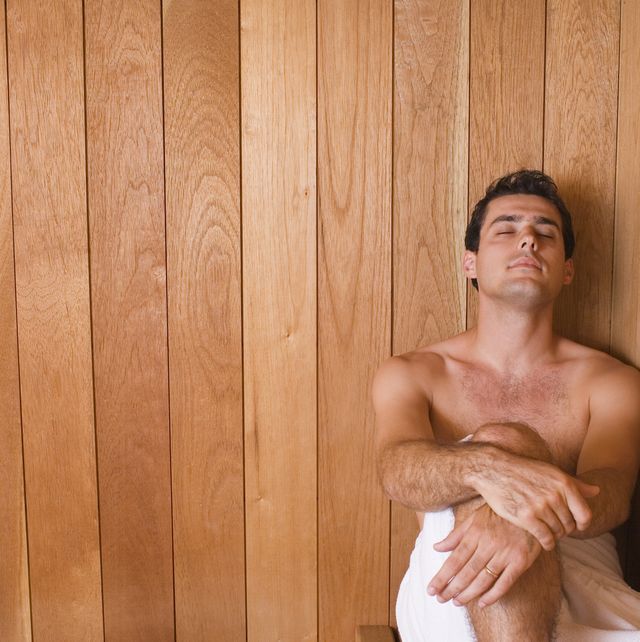 man relaxing in sauna