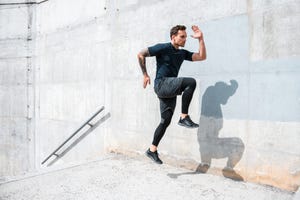 man running and jumping on the stairs