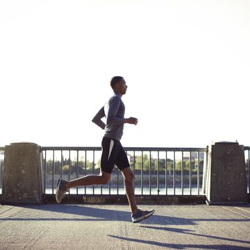 a man running in the city.